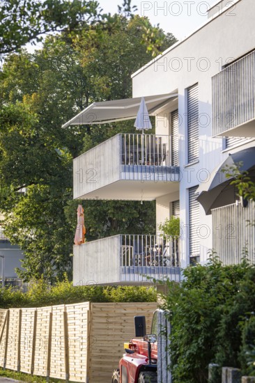 View of balconies on a modern residential building with surrounding trees, Nagold, district of Calw, Black Forest, Germany