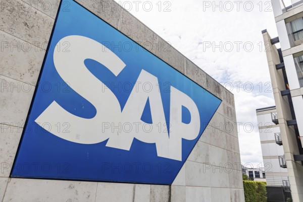 Logo and building of the software company SAP SE. Walldorf, Baden-Württemberg, Germany