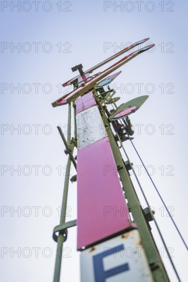 Close-up of a railway signal from a low perspective against a blue sky, Nagold, district of Calw, Black Forest, Germany