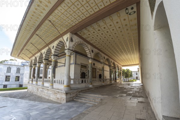 Wide angle view of the stunning architecture and intricate details of topkapi palace in istanbul, turkey, showcasing ottoman artistry and history