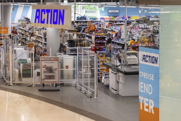 Action, Dutch non-food discounter with more than 3000 shops in 13 European countries. Bargain store in the Königsbau Passagen shopping centre in Stuttgart with logo and shelves. Stuttgart, Baden-Württemberg, Germany