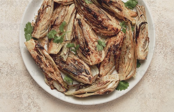 Baked, oven-baked fennel, with spices, in olive oil, homemade, no people