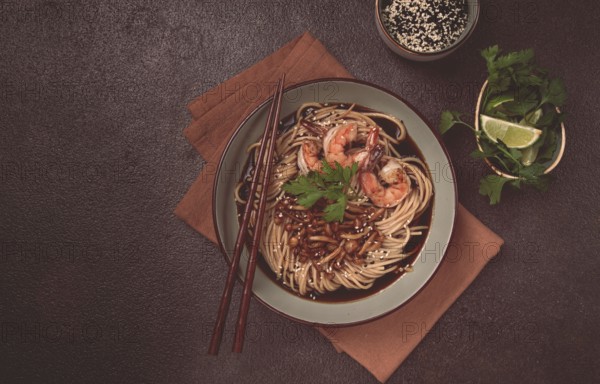 Soba, buckwheat noodles, with shimeji mushrooms and tiger shrimps, sesame, lime, parsley, homemade, no people