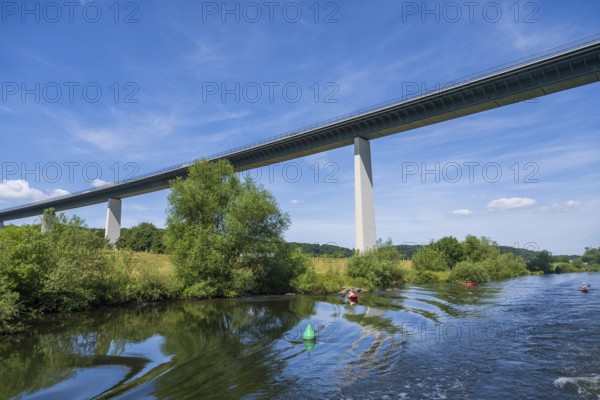 Motorway bridge A 52 over the Ruhr, from below, kayaker on the water, Mülheim an der Ruhr, Rur area, North Rhine-Westphalia, Germany