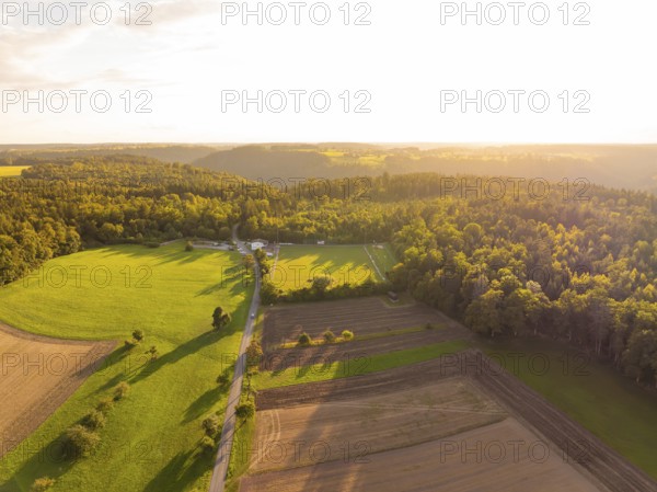 Wide landscape with shadow play over fields and forests at sunset, VFL Stammheim, Calw, Black Forest, Germany