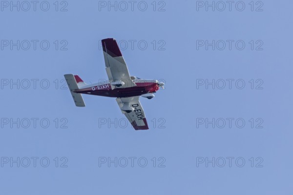 Single-engine aeroplane over Falckenstein, Kiel Fjord, Kiel, Schleswig-Holstein, Germany