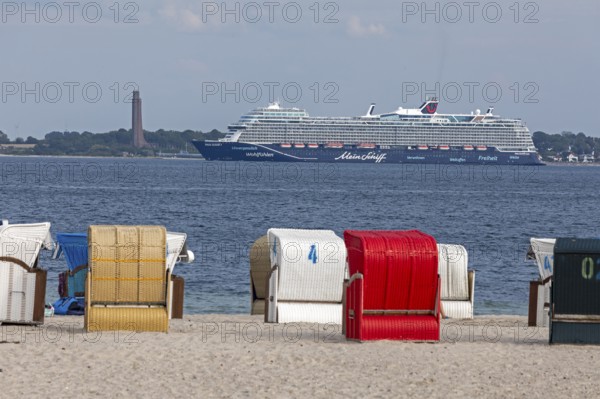 Cruise ship Mein Schiff 7, Laboe Naval Memorial, Kiel Fjord, beach chairs on the beach at Strande, Schleswig-Holstein, Germany