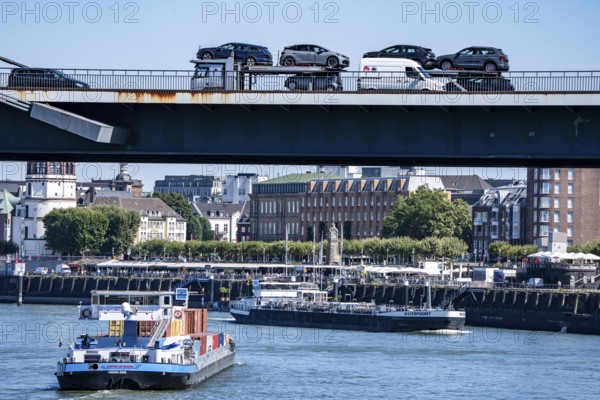 Cargo ship, container freighter, on the Rhine near Düsseldorf, Rheinkniebrücke, Altstadtufer, North Rhine-Westphalia, Germany