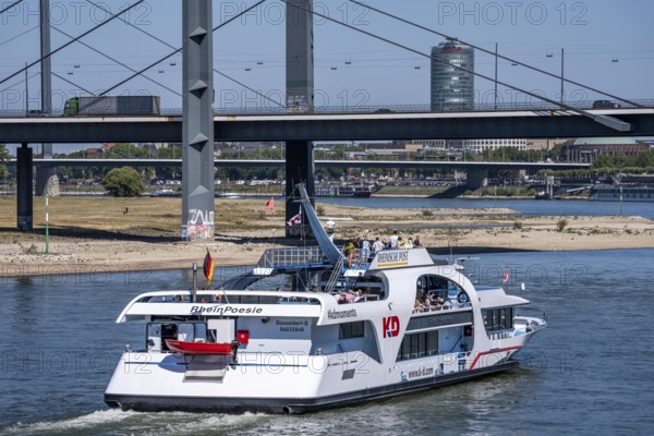 Rhine excursion boat, Rhine Poetry of the KD on the Rhine near Düsseldorf, Rheinkniebrücke, behind the Oberkassler Brücke, North Rhine-Westphalia, Germany