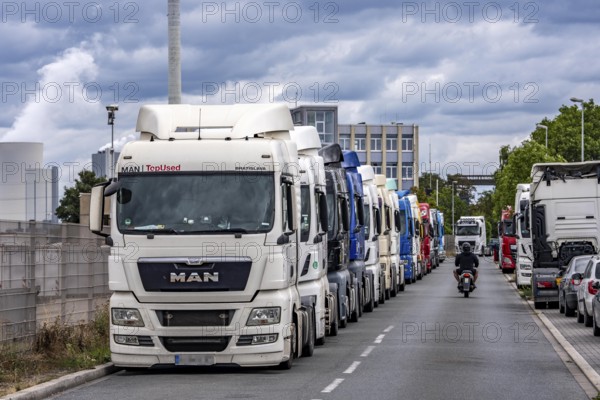 Truck tractors, exclusively from Eastern European countries, park in the harbour area, the canal port of Herne, the drivers wait for the next transport operation, spend their rest periods there, North Rhine-Westphalia, Germany