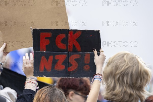 Counter-demonstration against the rally of AfD politician Joachim Paul in Ludwigshafen-Oggersheim***Picture: Sign with the inscription FCK NZS (Fuck Nazis)