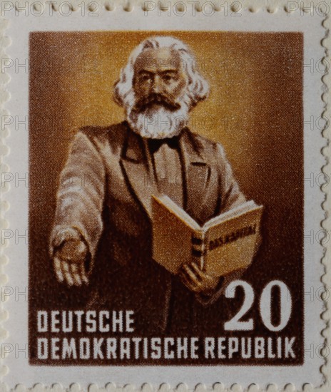 Karl Marx, 1818-1883, a German philosopher, economist, historian, sociologist, political theorist, journalist and socialist revolutionary. Portrait on a German post stamp
