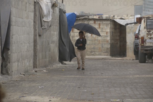 Syrian children playing in a refugee camp near the Turkish border on World Children's Day. Aleppo, Syria March 2, 2017, Aleppo, Syria