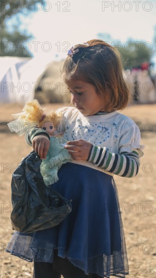 Syrian children playing in a refugee camp near the Turkish border on World Children's Day. Aleppo, Syria October 29, 2022, Aleppo, Syria