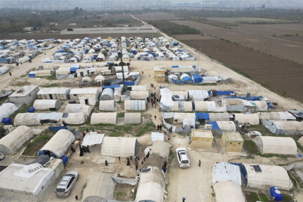 Aerial photo showing dozens of makeshift tents housing Syrian refugees near the Turkish border under difficult humanitarian conditions. Aleppo, Syria November 25, 2023, Aleppo, Syria