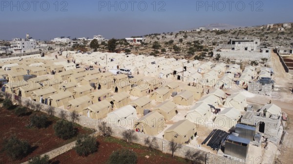 Aerial photo showing dozens of makeshift tents housing Syrian refugees near the Turkish border under difficult humanitarian conditions. Aleppo, Syria February 18, 2023, Aleppo, Syria