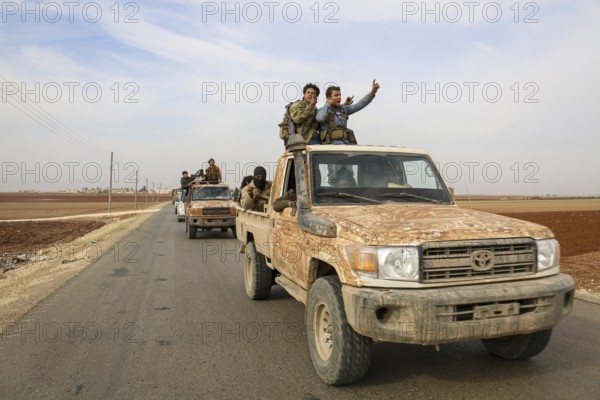 Fighters from the Free Syrian Army celebrate victory after capturing villages that were under the control of ISIS. Aleppo, Syria November 12, 2016, Aleppo, Syria