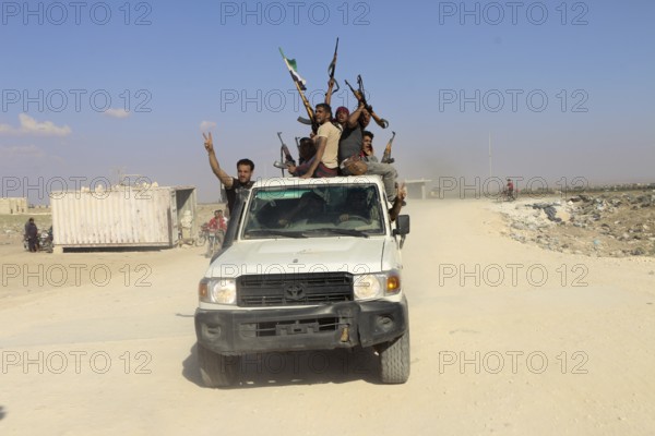 Fighters from the Free Syrian Army celebrate victory after capturing villages that were under the control of ISIS. Aleppo, Syria September 05, 2016, Aleppo, Syria