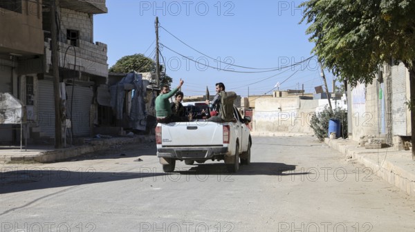 Fighters from the Free Syrian Army celebrate victory after capturing villages that were under the control of ISIS. Aleppo, Syria October 16, 2016, Aleppo, Syria
