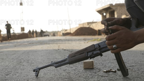 Syrian armed opposition fighters preparing ammunition during combat against ISIS. Aleppo, Syria October 10, 2016, Aleppo, Syria