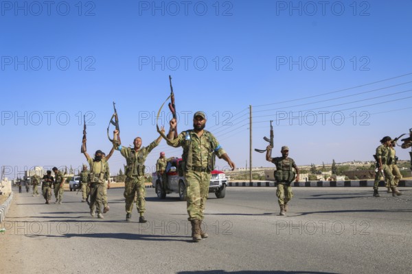 Fighters from the Free Syrian Army celebrate victory after capturing villages that were under the control of ISIS. Aleppo, Syria September 04, 2016, Aleppo, Syria