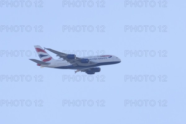 Airbus A380 jet passenger aircraft of BA British Airways airlines flying, England, United Kingdom