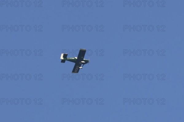 Van's RV-9 light aircraft flying in a blue sky, England, United Kingdom