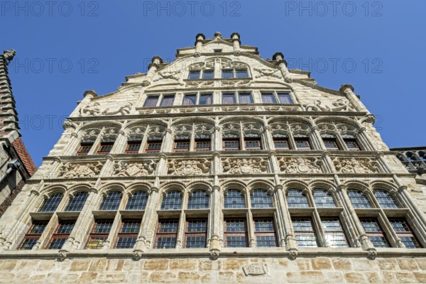 Façade of 16th century guildhall of the Free Boatmen, Gildehuis der Vrije Schippers at the Graslei in the city Ghent, Belgium, East Flanders, Belgium