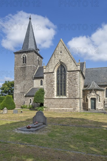 The old Sint-Pieterskerk, St. Peter's Church, now necropolis with graves of Belgian WWI soldiers buried inside at Grimde, Tienen, Tirlemont, Belgium