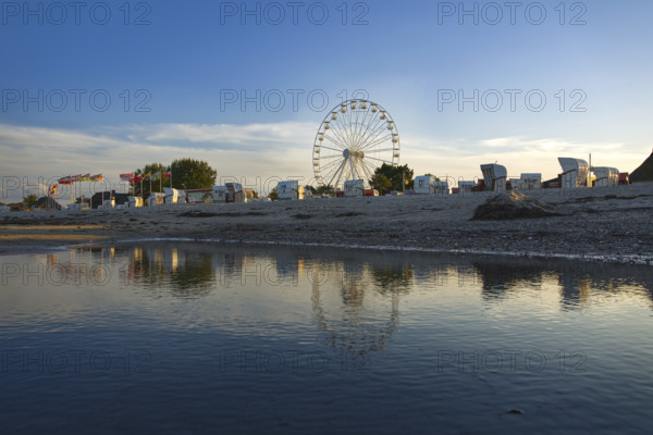 Ferris wheel and beach chairs on the beach at Dahme, Bay of Lübeck, Baltic Sea, Schleswig-Holstein