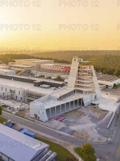 Futuristic-looking modern industrial building in the light of the sunset, Wolfsberg Nagold industrial area, Calw district, Black Forest, Germany
