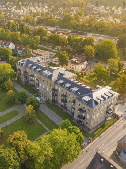 Large residential building with surrounding trees and streets, captured in autumnal scenery from the air, Nagold, district of Calw, Black Forest, Germany