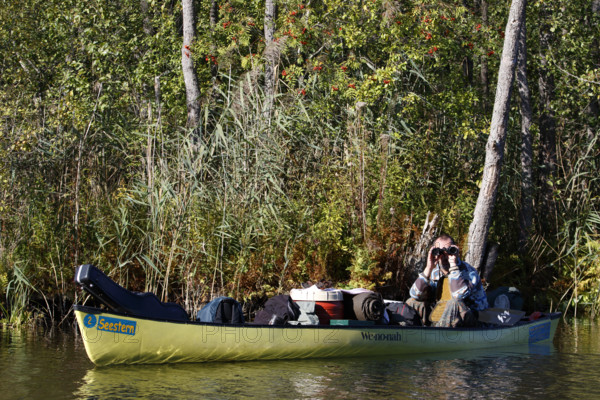 Canoeists in a canoe, Müritz National Park, Mecklenburg-Western Pomerania, Germany