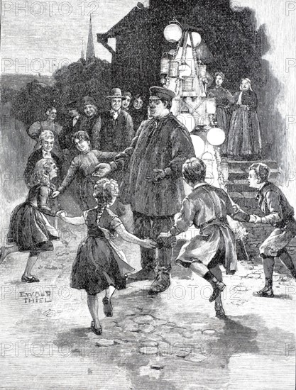 The Lambertus celebration in Münster, 1898, Children dancing around a disguised figure, in the background the pyramid of lights, Germany, Historical, authentic, digitally restored reproduction from a 19th century original, Record date not stated
