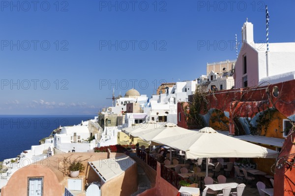 Terrace of a restaurant overlooking the sea, Oia, Thira, Santorini, Cyclades, Greece