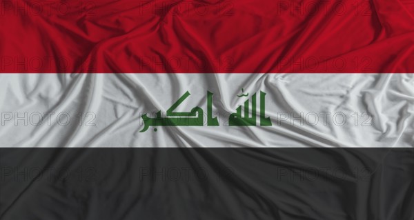 Iraqi flag with fabric texture background. National flag of Iraq with cloth texture