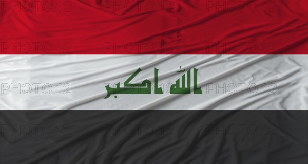 Close up of Iraq flag waving. Flag of Iraq with cloth texture