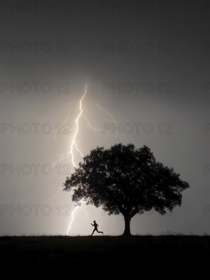 A person runs past a tree in the dark while lightning strikes in the background, danger to life due to lightning strike, AI generated, AI generated