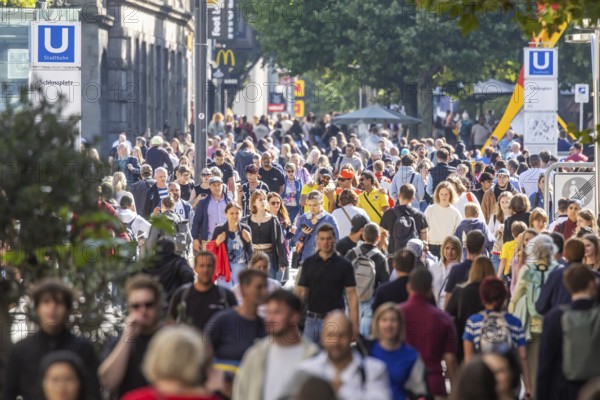 Crowd on the way in the shopping street. Königstraße pedestrian zone in Stuttgart, Baden-Württemberg, Germany