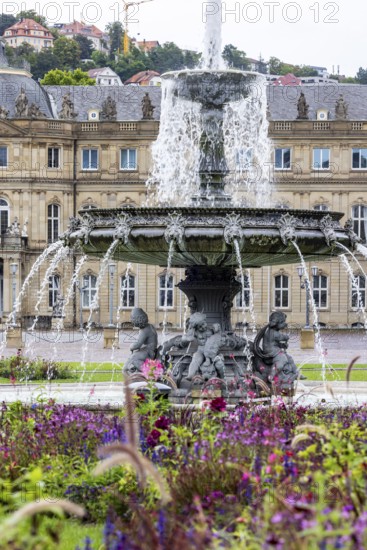 New Palace with Palace Square and fountain. City view of Stuttgart, Baden-Württemberg, Germany