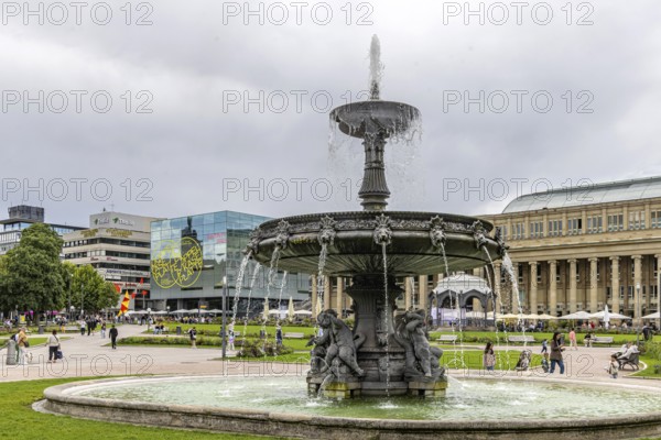 Fountain on the castle square, art museum and royal building. City view of Stuttgart, Baden-Württemberg, Germany