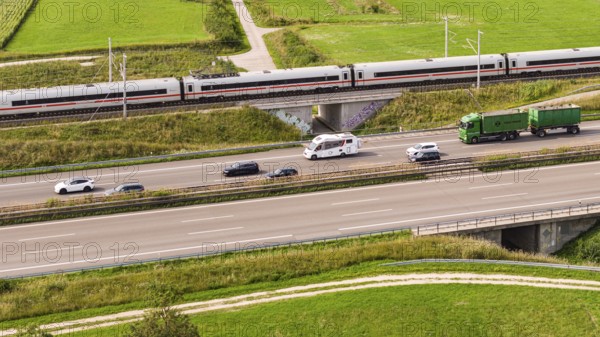 A8 motorway near Kirchheim unter Teck. The route of the new high-speed railway line from Stuttgart to Ulm runs parallel to the road. Deutsche Bahn ICE train. Kirchheim unter Teck, Baden-Württemberg, Germany