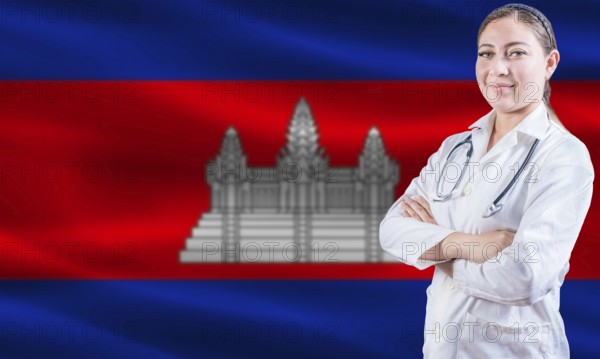 Female doctor on Cambodia flag. Doctor with crossed arms on Cambodia flag. Cambodia health and care concept