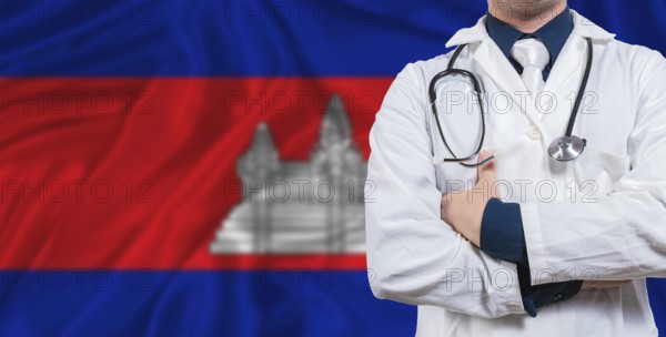 Male doctor with stethoscope on Cambodia flag. Doctor holding stethoscope on Cambodia flag