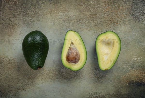Fresh sliced avocado on the table, top view, food background, concept, menu, food styling