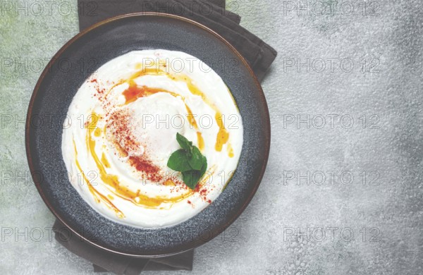 ?ilbir, traditional Turkish breakfast, Turkish eggs with yogurt and butter, homemade, no people