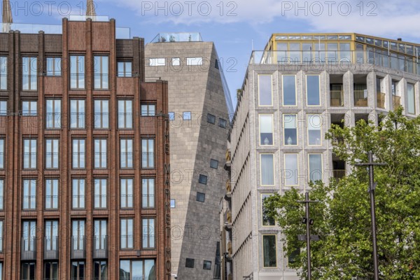 The Grote Markt in the old town of Groningen, modern facades of hotel and commercial buildings, in the centre the Forum Groningen, Netherlands