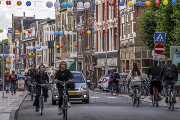 Houses on the Oude Ebbingestraat, historic centre of Groningen, bicycle traffic, Netherlands