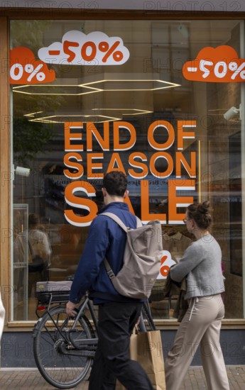 Fashion shop, boutique, with advertisement in the window for the end of season sale, summer sale, Groningen, Netherlands