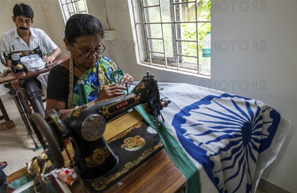 Employees of the Assam Khadi and Village Industries Board stitching in a manufacturing unit of Indian National Flags, ahead of 79th Independence Day, in Guwahati, India on 11 August 2025